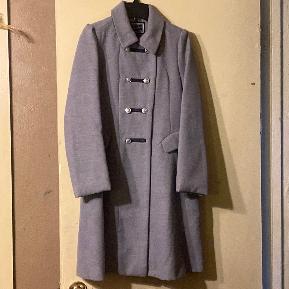 Grey jacket pretty silver buttons nice warm and cozy .
